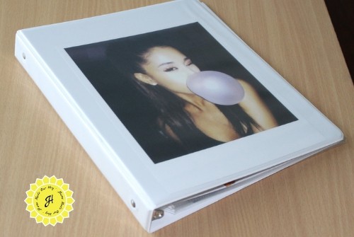 binder with photo of ariana grande on the cover