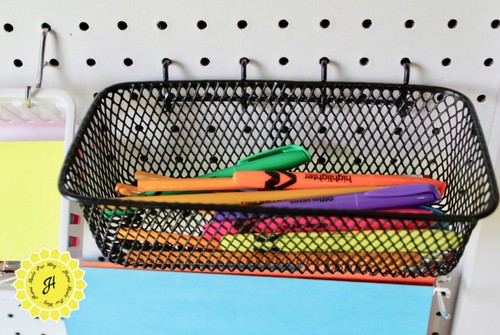 pegboard basket with school supplies