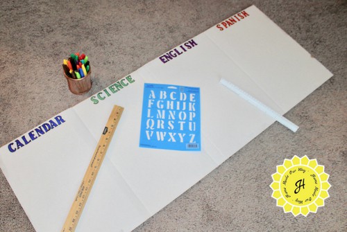 board with four sections stenciled in for homework station