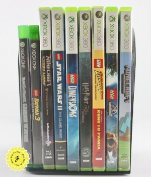 multimedia collection of Xbox video games cartridges and CDs