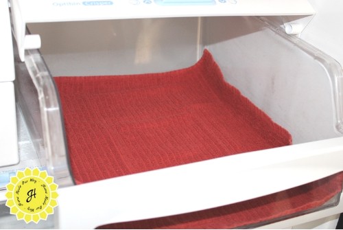 using a dish towel as a liner in a refrigerator