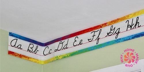 image of cursive alphabet classroom banner